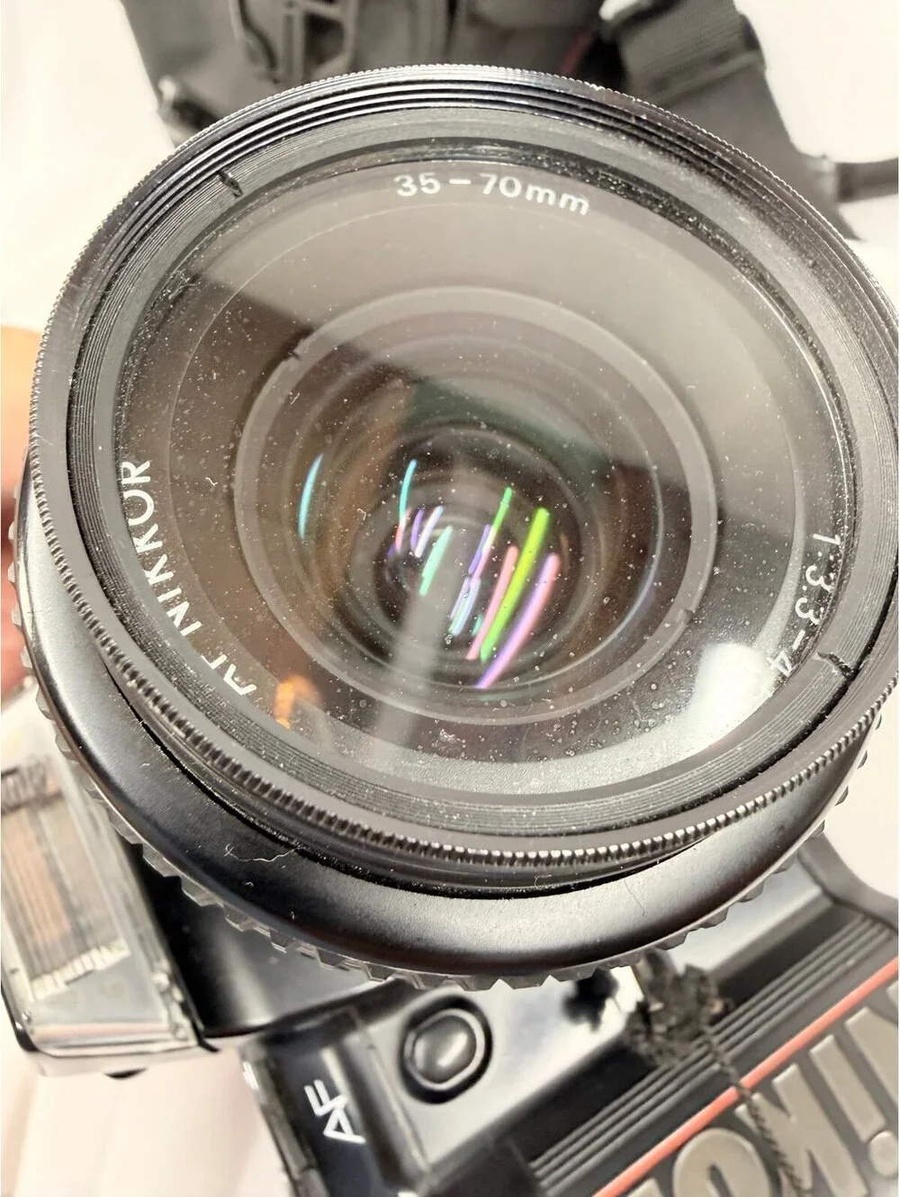 Vintage film Nikon N4004 AF Camera with AF Nikkor 35-70mm 1:3.3-4.5 Lens
